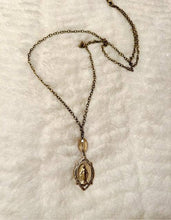 Load image into Gallery viewer, Bronze Gold Mary Necklace with clear swarovski
